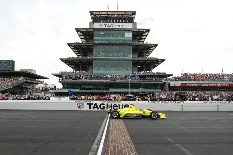 Simon Pagenaud crosses the start/finish line at the Indianapolis 500 2019