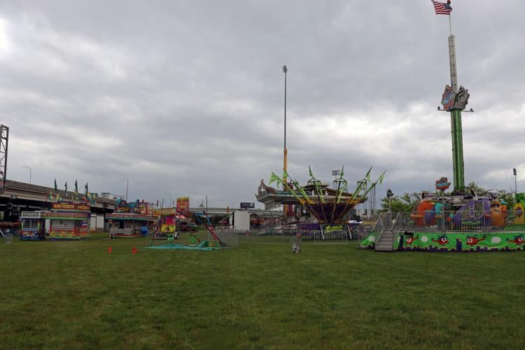 Crews set up booths along the Ohio River one day before Thunder Over Louisville 2023