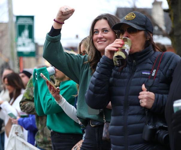 Woman cheers during St. Patrick's Day Parade.JPG