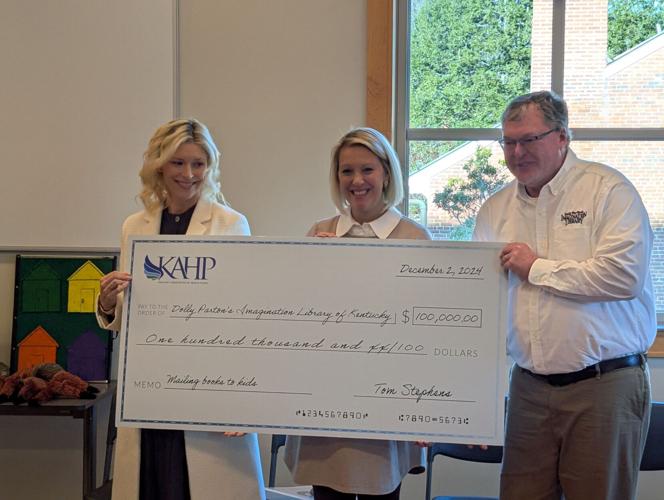 First Lady Britainy Beshear joins Katherine North of Kentucky Assoc. of Health Plans and JC Morgan of Dolly Parton's Imagination Library of KY- Credit KAHP.jpg