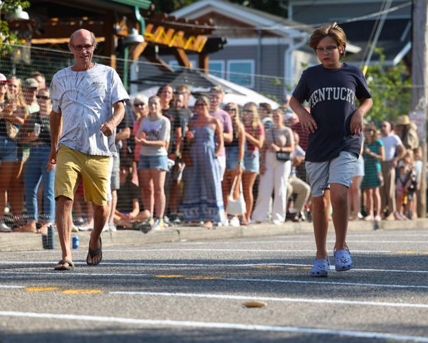 Boy runs to measure Dainty length.JPG