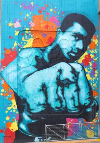 Muhammad Ali punching in downtown Louisville mural.JPG