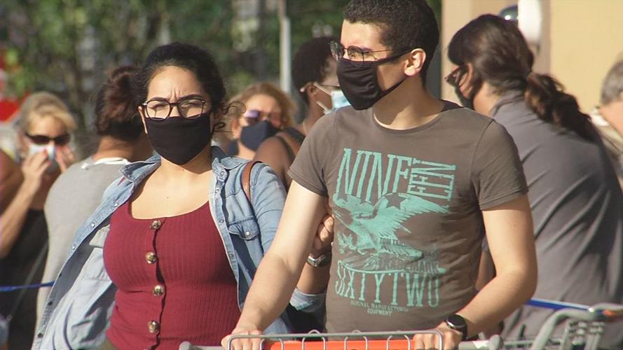 Customers wear masks at Louisville Walmart