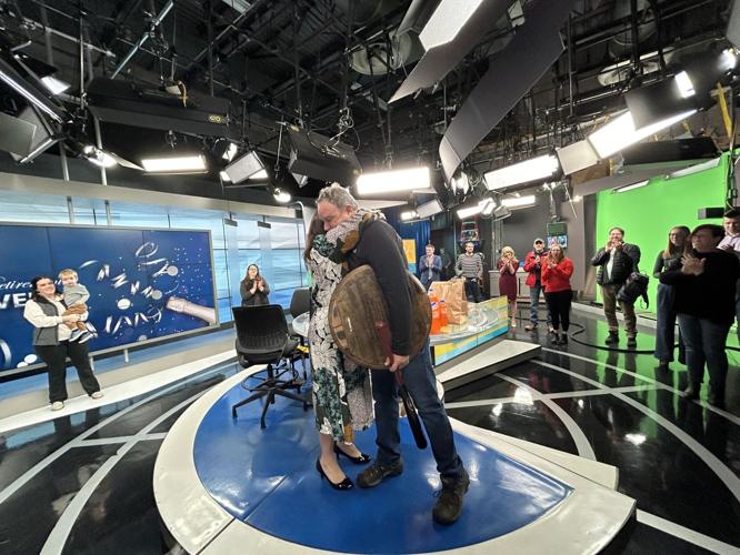 Dave White hugs Jen Keeney