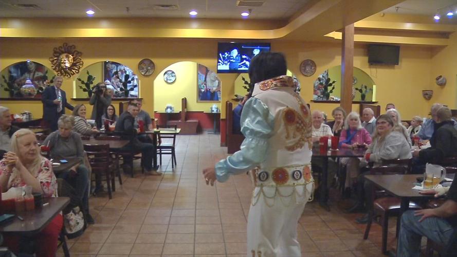 Samu performs as Elvis to crowd.jpg