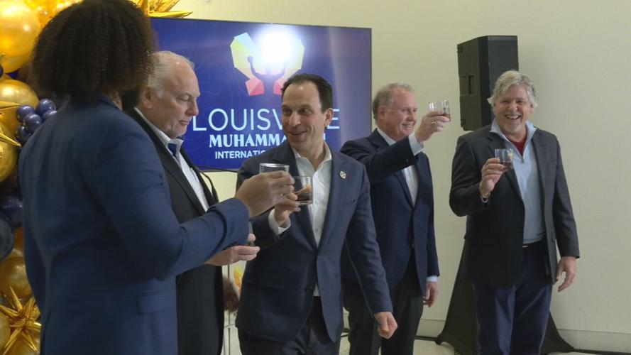 Louisville Muhammad Ali Airport passenger record celebration