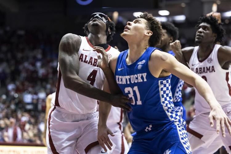 Alabama forward Juwan Gary and Kentucky guard Kellan Grady wait for a rebound.jpeg