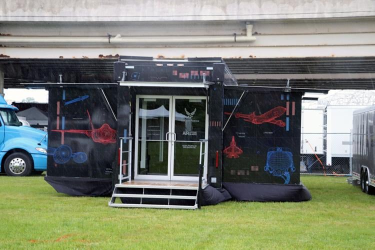 Crews set up booths along the Ohio River one day before Thunder Over Louisville 2023