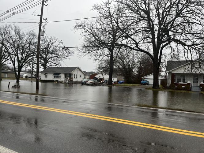 Front yards flooded at homes near Highway 44 in Bullitt County on Jan. 3, 2023