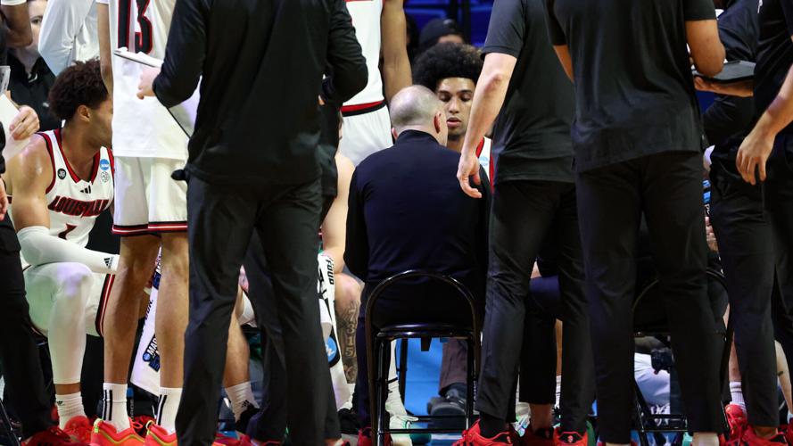 UL NCAA Pat Kelsey Huddle