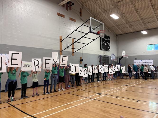 Protesters at Joe Creason Park development meeting