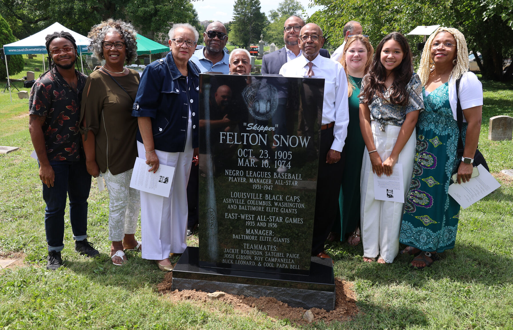 Family of Felton Snow by monument