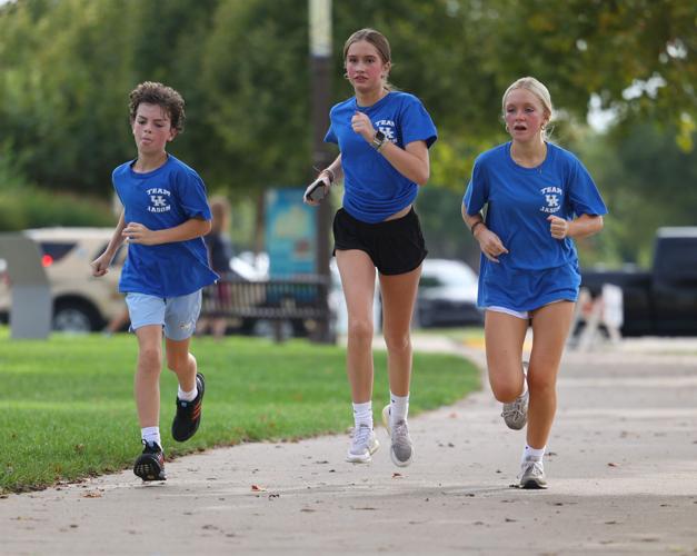 Three children run at the 5k Race to Cure Sarcoma.JPG