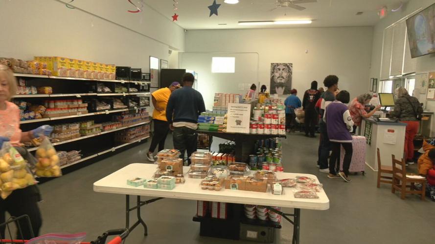 Louisville residents at local food pantry