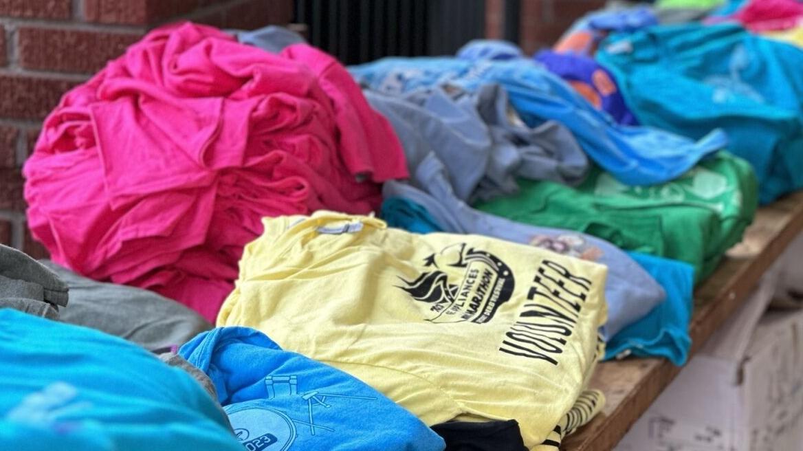 Derby T-shirts for sale during annual KDF yard sale - 6.13.24