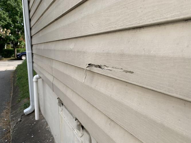 Gunfire damage to Highlands business.jpg