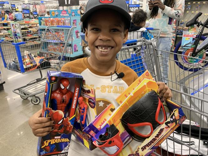 Levi and his Spiderman toys after shopping spree