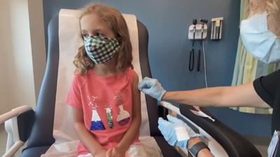 Child receiving vaccination