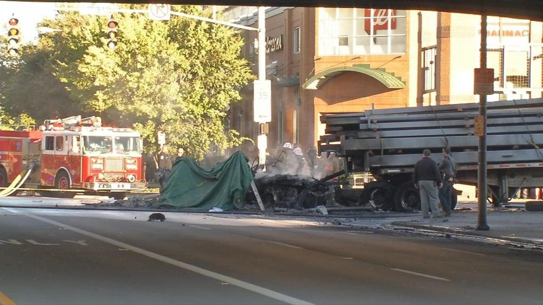At least 1 person dead after crash and fire on East Broadway in