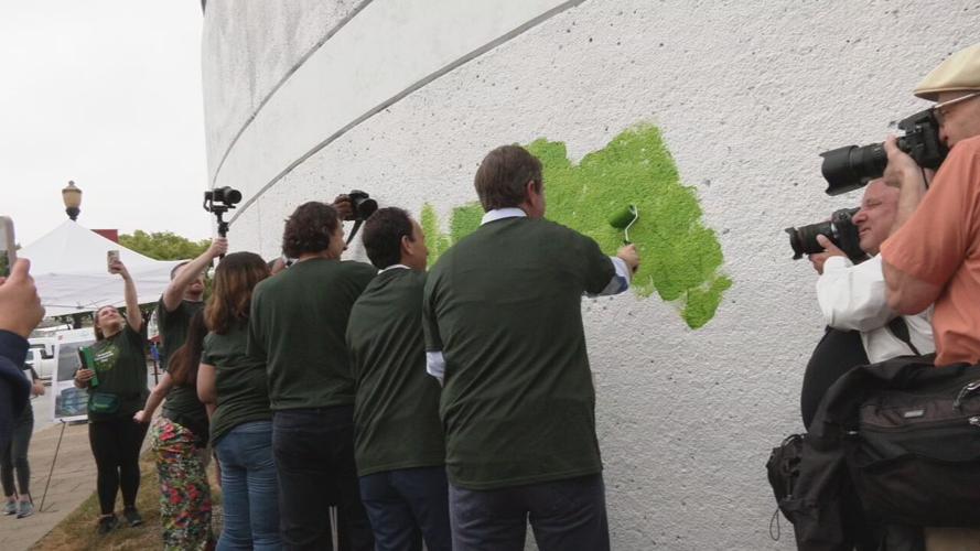Humana employees paint parking garage on Community Day