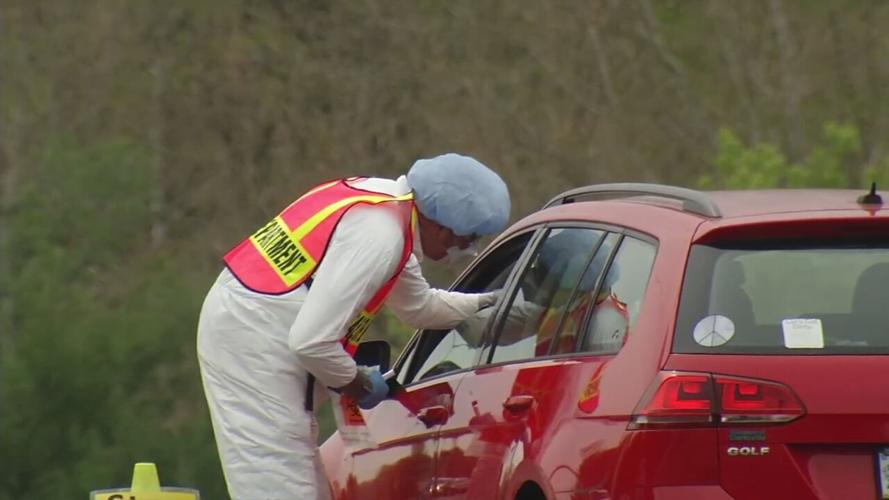 Covid-19 test administered at drive-thru site.jpeg
