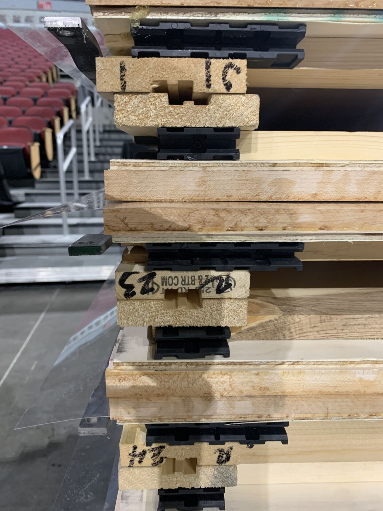 NCAA FLOOR  BEING INSTALLED AT YUM CENTER 3-21-2023 (20).JPG