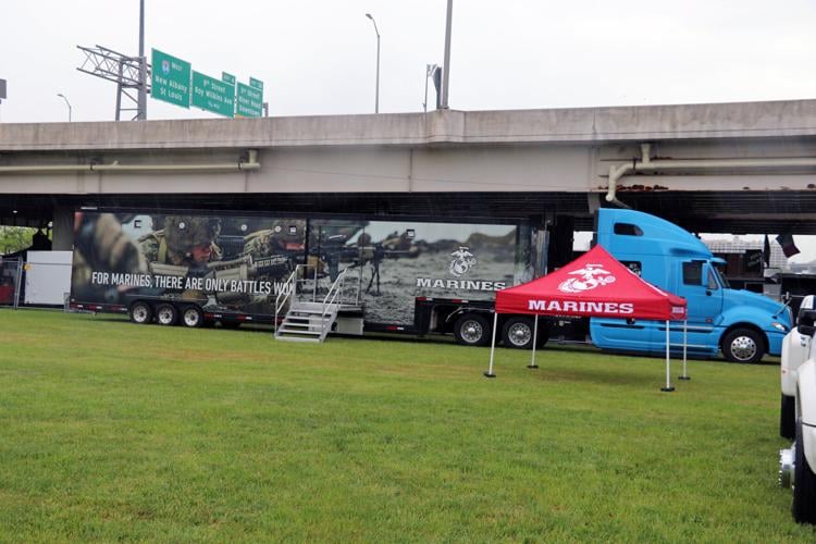 Crews set up booths along the Ohio River one day before Thunder Over Louisville 2023
