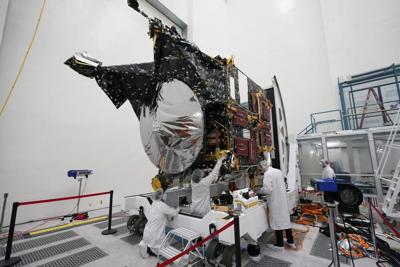 Technicians work on the Psyche spacecraft at the NASA Jet Propulsion Laboratory.jpeg