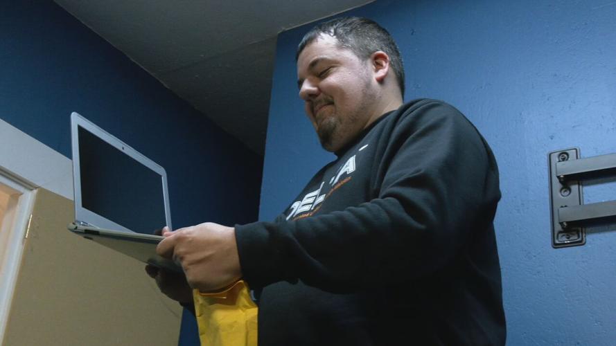 Wes Hinton of DELTA Foundation with donated chromebooks - 2.5.24