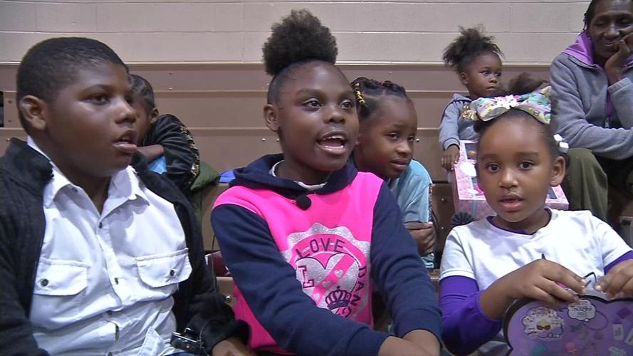 Santa visits hundreds of children at community event in Park Hill neighborhood