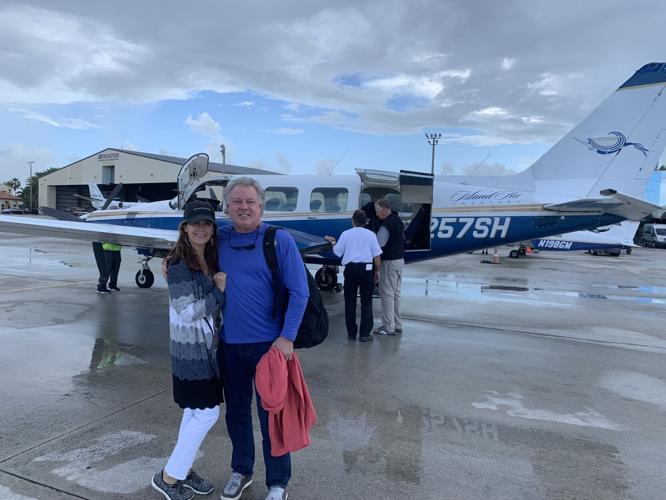 Christopher Moore with his wife at airport.jpg
