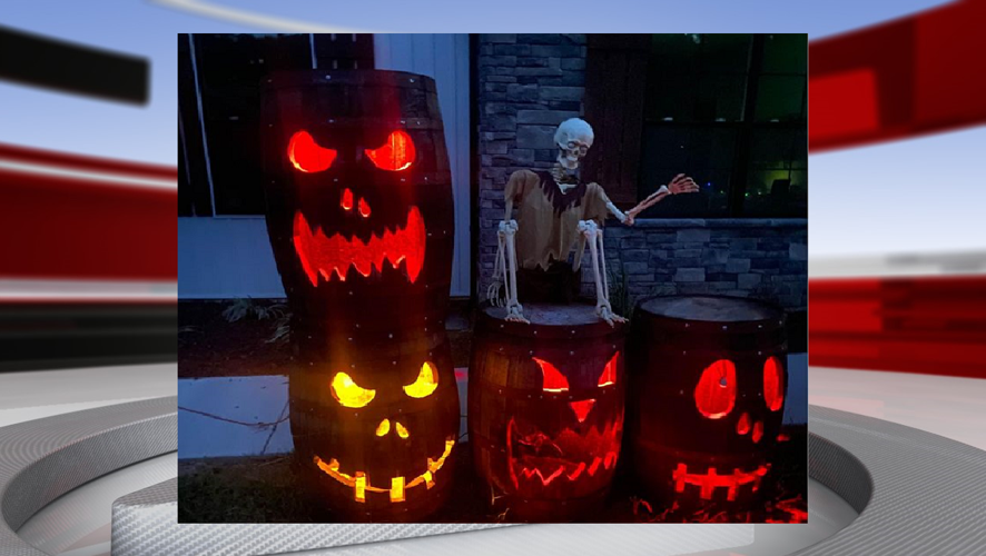 Bourbon Barrel Jack O Lanterns lit