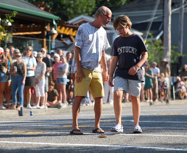 Man and boy look at Dainty length.JPG