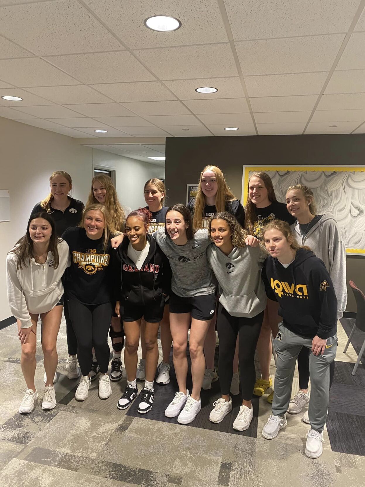 CAITLIN CLARK AND TEAM.jpg