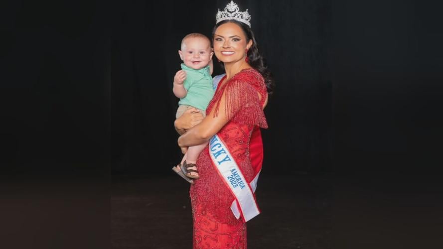Kentucky pageant winner holds baby
