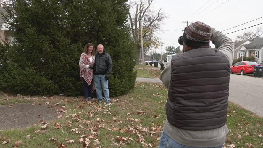 Greg and Karen Kaelin stand before the future 2022 Light Up Louisville Christmas tree