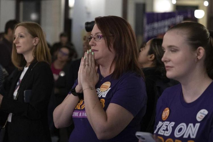 A supporter holds her breath as preliminary.jpeg