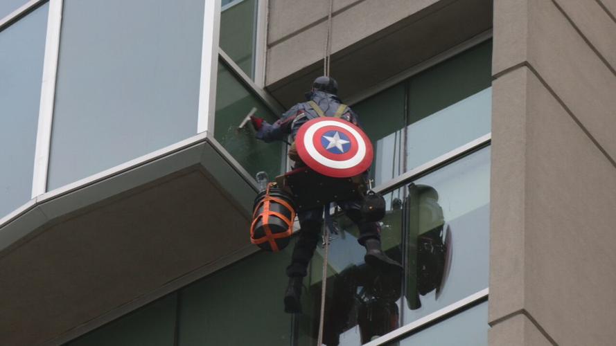 Window washers rappel from Norton Children's Hospital dressed as superheroes