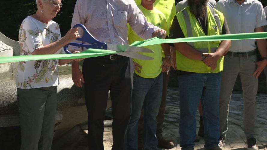 Attendees of the ribbon-cutting for the restored Hogan's Fountain in Cherokee Park
