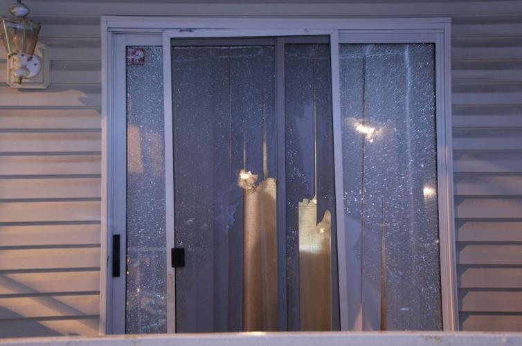 Damage to Breonna Taylor's porch door after LMPD raid
