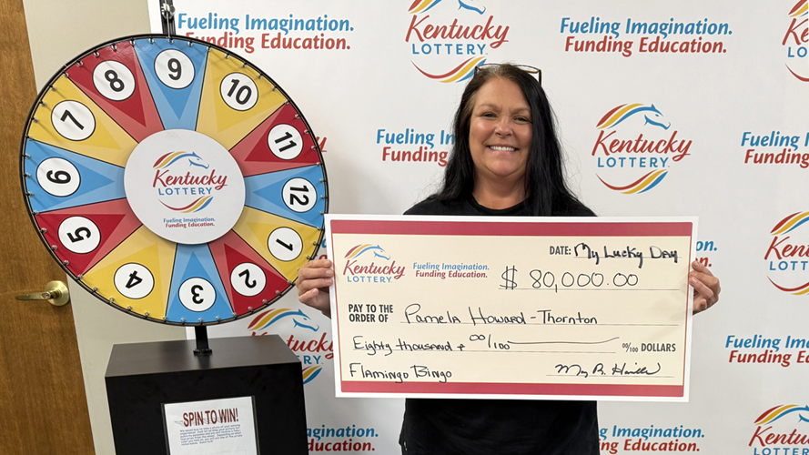 Pamela Howard-Thorton with Kentucky Lottery check