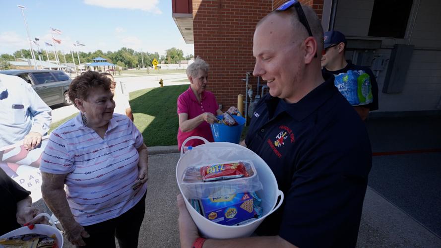 Volunteers Deliver Baskets to Firefighters