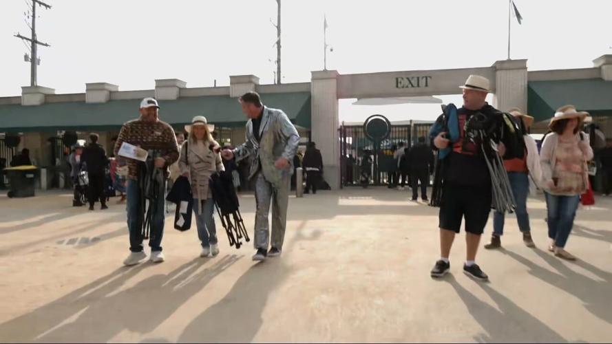 Keith Kaiser welcomes Derby attendees headed to the infield at Churchill Downs