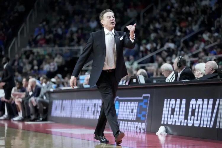 Rick Pitino works the bench in the first half.jpg