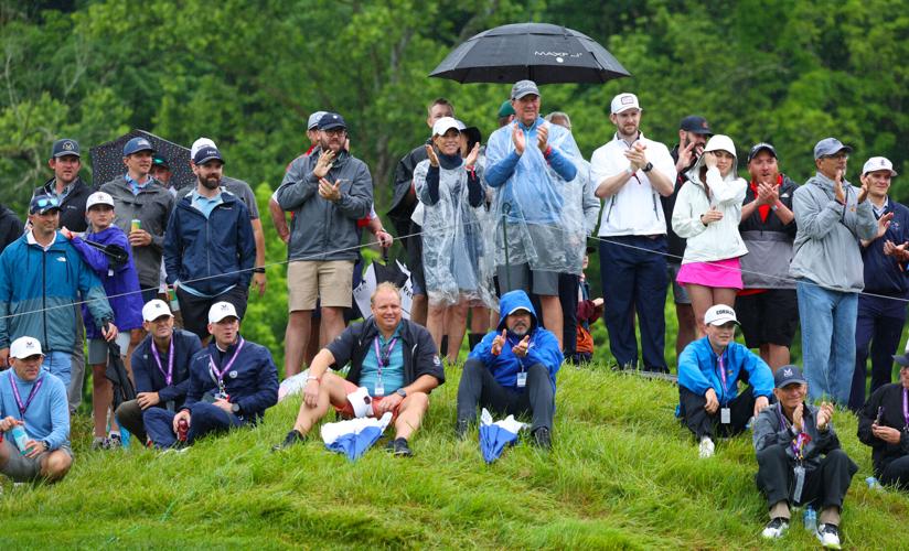 People clap at Valhalla green.JPG