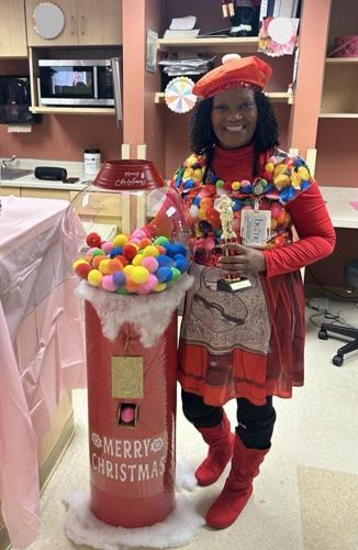 Home of the Innocents Christmas decorating contest staff member
