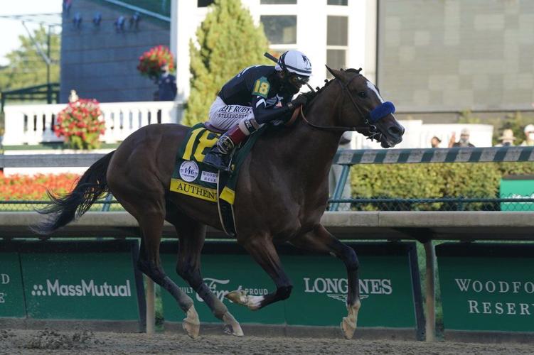 Authentic heads to the finish line to win the 146th running of the Kentucky Derby