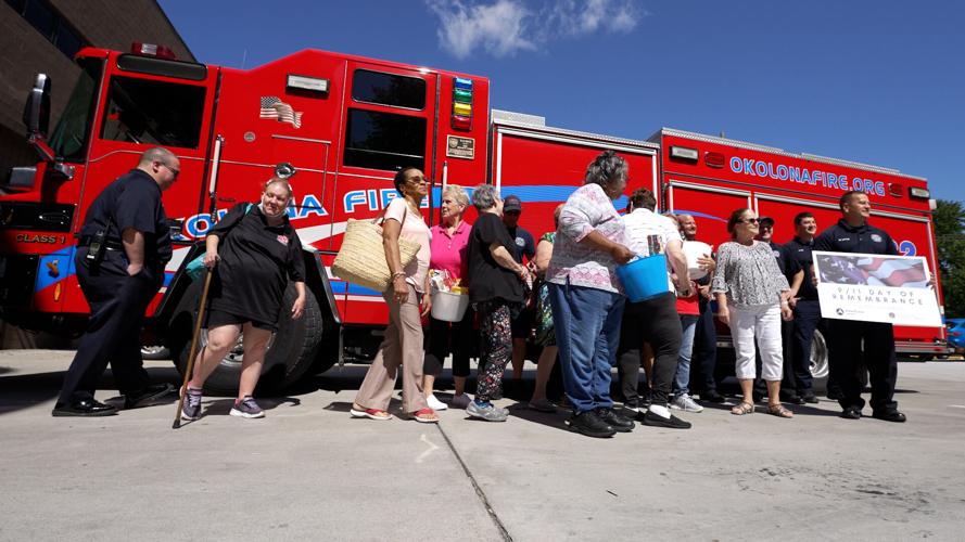 Volunteers Deliver Baskets to Firefighters