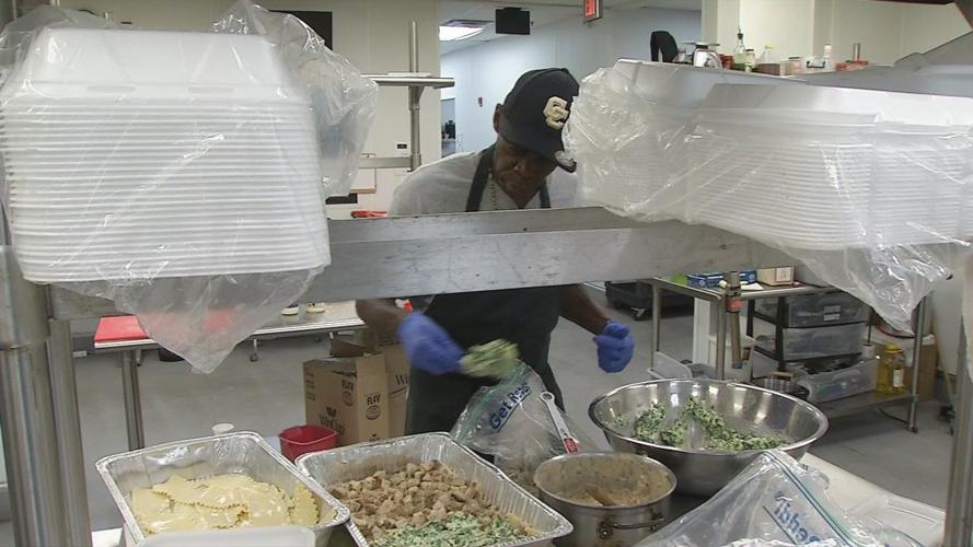 Man prepares food at Chef Space