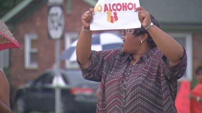 Residents of west Louisville protest proposed liquor store on Wilson Avenue